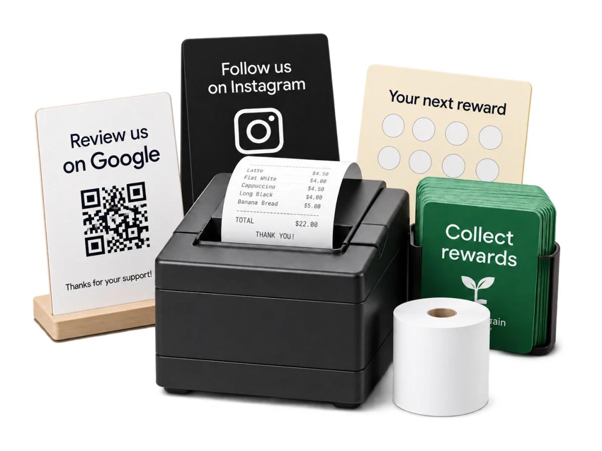 Illustrative unbranded receipt printer, paper roll, review and social signs, and loyalty cards